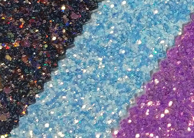 Chiny Atrakcyjny styl 3D Glitter Fabric Multi Color Pu Glitter Leather Rainbow Chunky Glitter Fabric dostawca